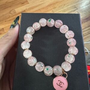 Elegant Pink Beaded Bracelet with Charm